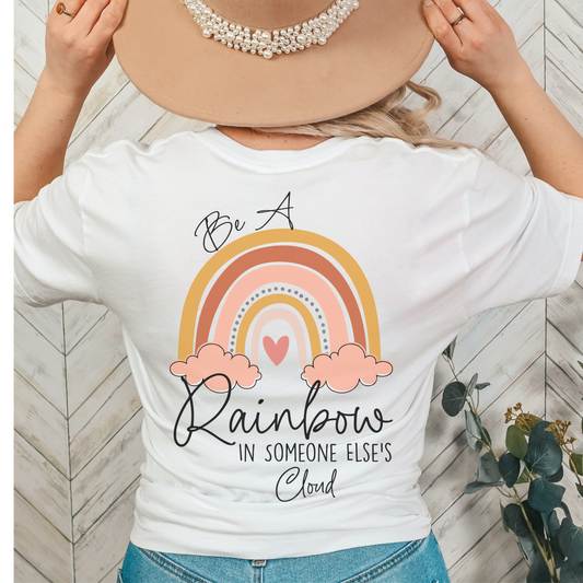 BE THE RAINBOW IN SOMEONE ELSE'S DAY- Unisex Jersey Short Sleeve Tee